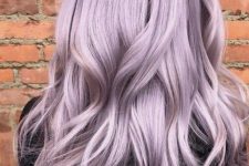 beautiful long lilac to blush hair with shaggy layers and a lot of voluem is a cool and chic idea for a delicate and soft look