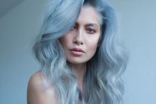 delicate pastel blue hair with an ombre effect, much volume and waves is a fantastic idea for anyone who loves such colors