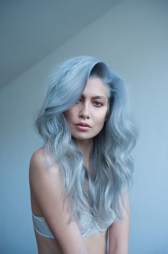 delicate pastel blue hair with an ombre effect, much volume and waves is a fantastic idea for anyone who loves such colors
