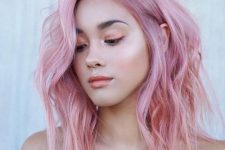 fab pink shoulder-length hair with much texture and volume is a very eye-catchy and cool solution to rock