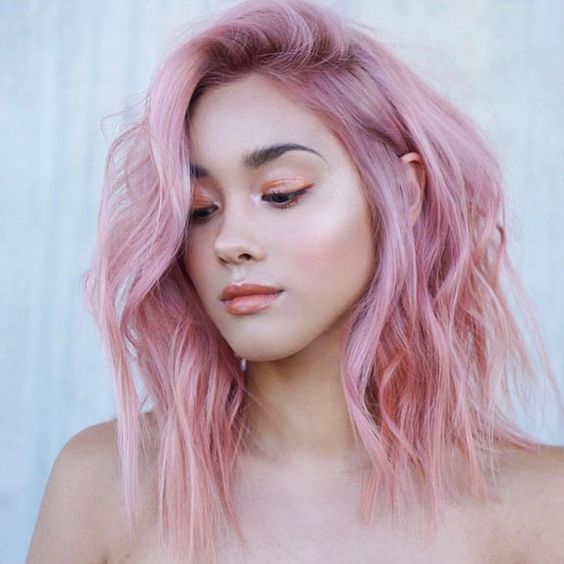 Fab pink shoulder length hair with much texture and volume is a very eye catchy and cool solution to rock