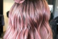 gorgeous rose shoulder-length hair with a bit of waves and a top knot is amazing, it looks soft and delicate