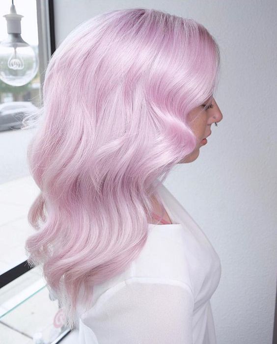 jaw-dropping silver pink hair with a lot of volume and some waves looks absolutely striking