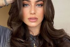long chocolate brown hair with a lot of volume and waves is a stunning solution to rock, it looks really amazing