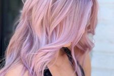 long mauve hair with silver balayage, with shaggy layers and some waves is a stylish and cool idea to try