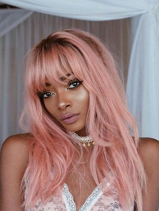 Long pastel pink hair with much texture, with bangs and layers is a very beautiful and candy like idea