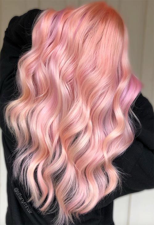 long peachy pink hair is a beautiful idea if you love pastels but want a warm shade, add volume and waves and go