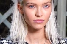 lovely platinum blonde long hair with a bit of texture is a cool idea, such a hair color pefectly matches  the girl’s eyes