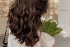 medium-length chocolate brown wavy hair, with volume is a stunning and chic idea to rock, it looks very elegant