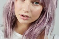 medium-length lavender silver hair with a classic fringe and shaggy layers is an eye-catchy and lovely idea