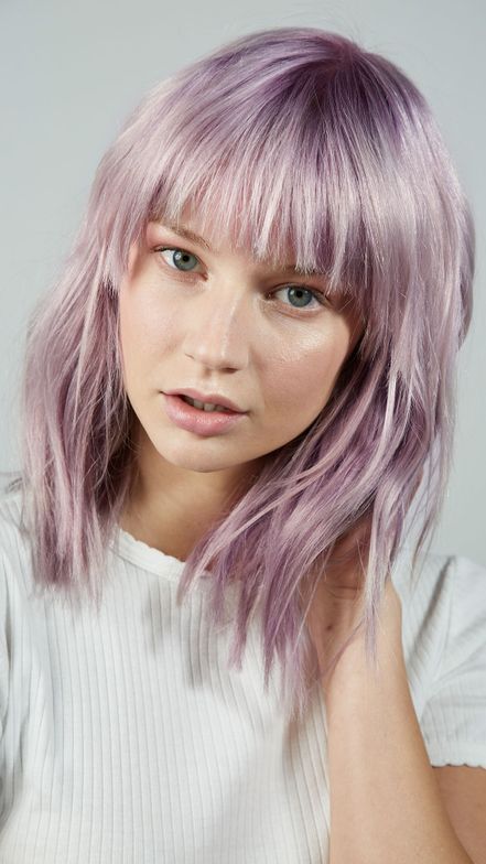 Medium length lavender silver hair with a classic fringe and shaggy layers is an eye catchy and lovely idea