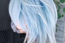 pastel blue hair of a super delicate shade, with a mallet haircut is a trendy idea to go for right now