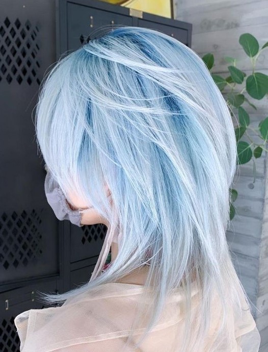 pastel blue hair of a super delicate shade, with a mallet haircut is a trendy idea to go for right now