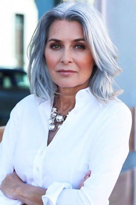 Shoulder length pale blue hair with a bit of layers and a lot of volume looks dreamy and very eye catching