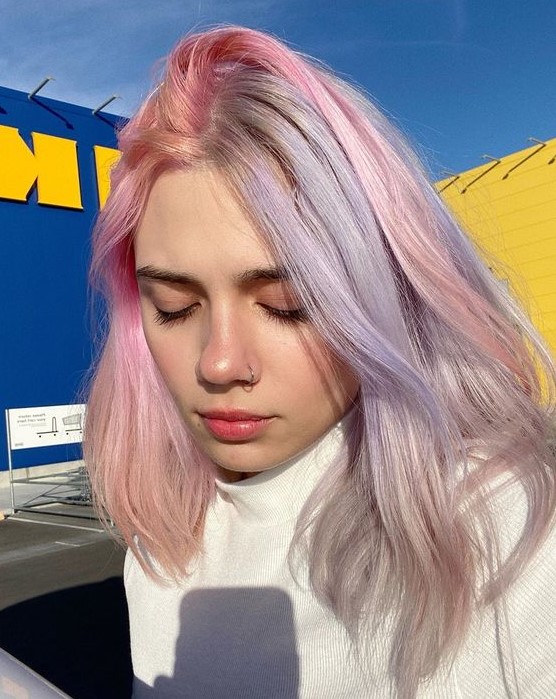Split dye pastel hair   lilac and pink, with volume and a bit of texture is a very tender and cute take on split dye