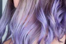superb medium-length hair with lilac and purple ombre and a darker root plus waves is amazing for anyone