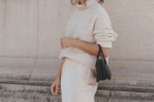 a beautiful and simple winter bridal shower look with a sweater, a maxi skirt, a mini bag and statement earrings