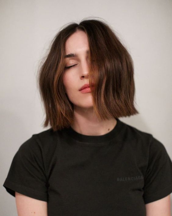 a beautiful long chestnut bob with waves is a catchy and lovely idea, and slight balayage adds dimension to the look