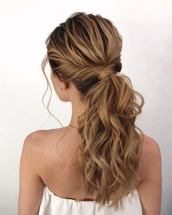 a beautiful wavy low ponytail with a wavy top and some locks down is always a good idea to rry