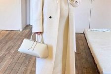 a chic bridal shower look with a creamy midi dress, a creamy coat, tan boots and a small creamy bag for winter