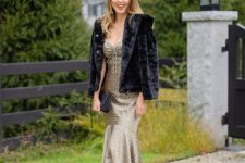 a chic winter wedding guest look with a polka dot mermaid dress, a black faux fur jacket, black shoes