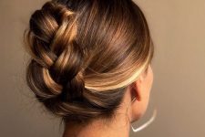 a classy braided updo with a sleek top is a cool and catchy idea even if your hair isn’t look