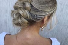 a cool braided updo with a bump on top is a lovely solution for medium and long hair