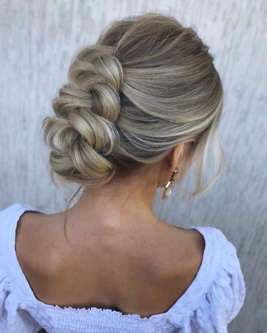 a cool braided updo with a bump on top is a lovely solution for medium and long hair