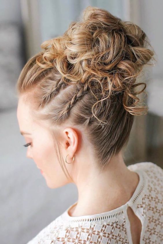 a curly top knot and braids on the sides is a lovely solution if you like braids and informal looks