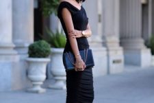 a fail-proof look with a black midi fitting dress, a black clutch and black strappy heels