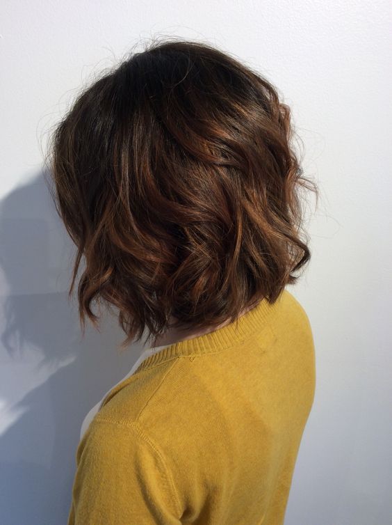 a long chestnut bob with messy waves and volume is always a good idea, it looks nice and catchy