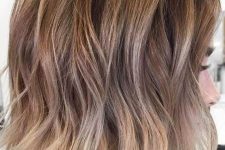 a lovely and catchy midi bronde bob with caramel highlights and bleached ends plus waves is super up-to-date