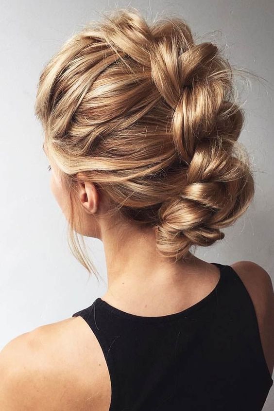 a messy and volumetric braidd updo for medium and long hair is a creative and catchy solution for a party