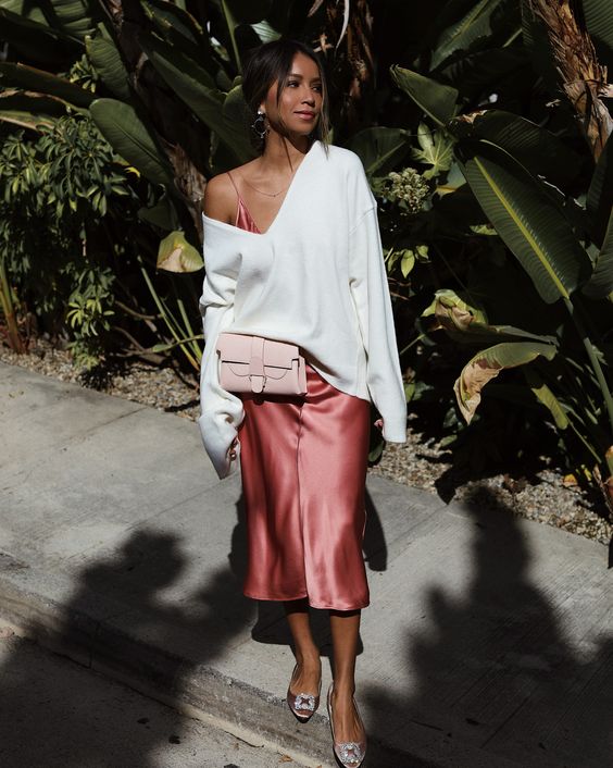 a pink slip midi dress, a white pullover on top, blush buckle shoes and a small blush bag for a spring to summer look