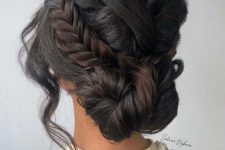 a pretty low twisted updo with a side fishtail braid and face-framing hair is cool
