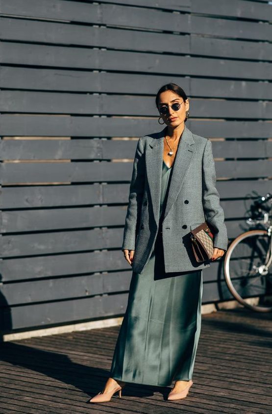 a refined spring look with a green maxi slip dress, a grey oversized blazer, nude shoes and a printed bag