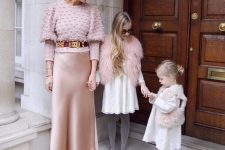 a tender outfit with a blush polka dot sweater, a blush stain midi, pink heels, a statement fuchsia belt and statement earrings