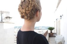 a tight braided updo will keep you picture-perfect all day long and it looks cool and boho-inspired