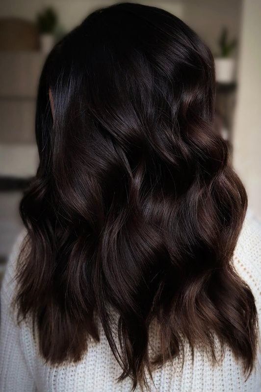 beautiful and exquisite dark brown hair with delicate dark chestnut highlights, volume and waves, is a gorgeous solution