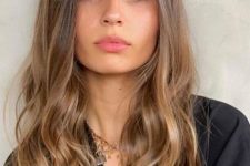 a lovely hairstyle with a caramel balayage