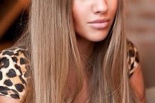 extra long light brown hair with blonde balayage is a beautiful solution that looks amazing