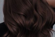 jaw-dropping long and volumetric dark brown hair with waves is a fantastic idea to rock, show off your gorgeous locks