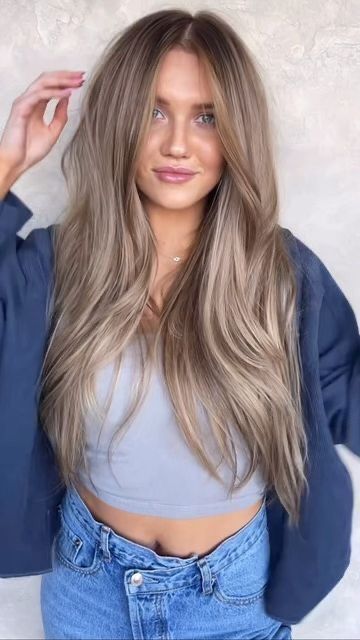 long ashy brown hair with a lot of volume is amazing for a bold and catchy look