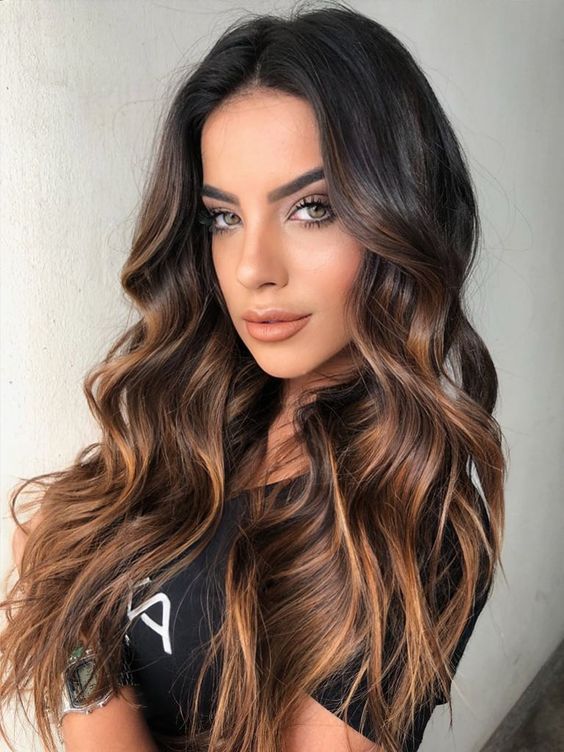 long dark brunette hair with caramel balayage, waves and volume, always looks spectacular