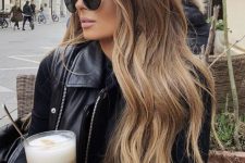 long light brown with blodne balayage, texture and waves is a beautiful and always cool idea