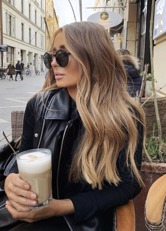 long light brown with blodne balayage, texture and waves is a beautiful and always cool idea