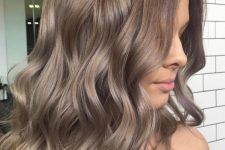 ombre wavy locks from rich brown to ashy brown is a trendy modern idea to try