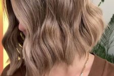 20 a stylish bronde long bob with a bit of waves and volume is a catchy and stylish idea to rock