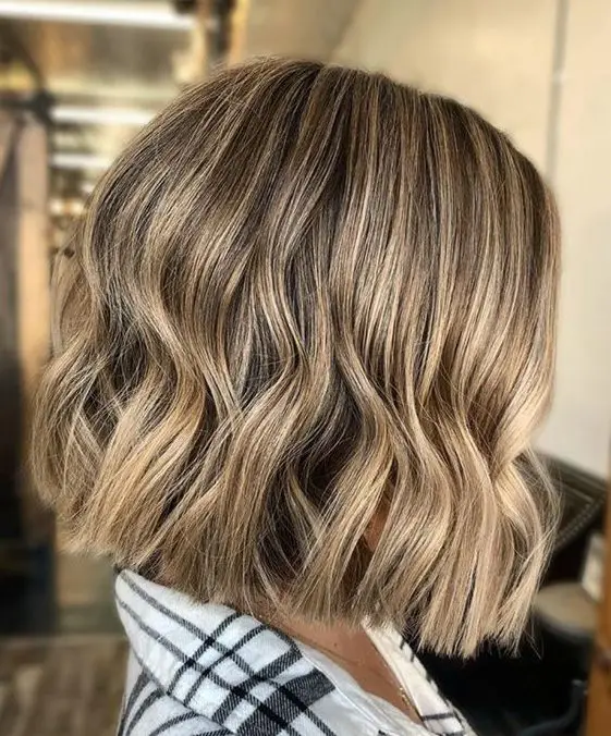 a stylish textural bronde choppy bob with waves and a darker root is a cool and fresh solution to try, it looks cool