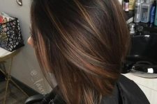 23 a chocolate brown straight bob with light caramel balayage to give it a dimension